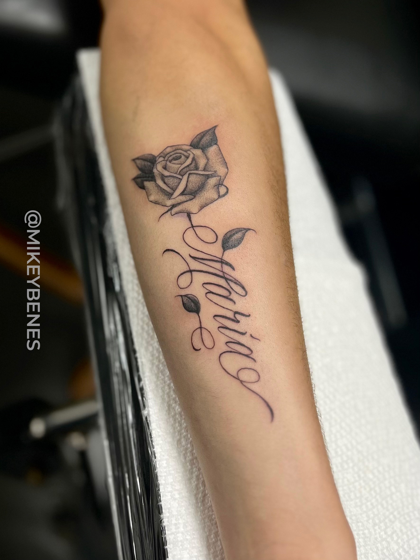 rose name tattoo