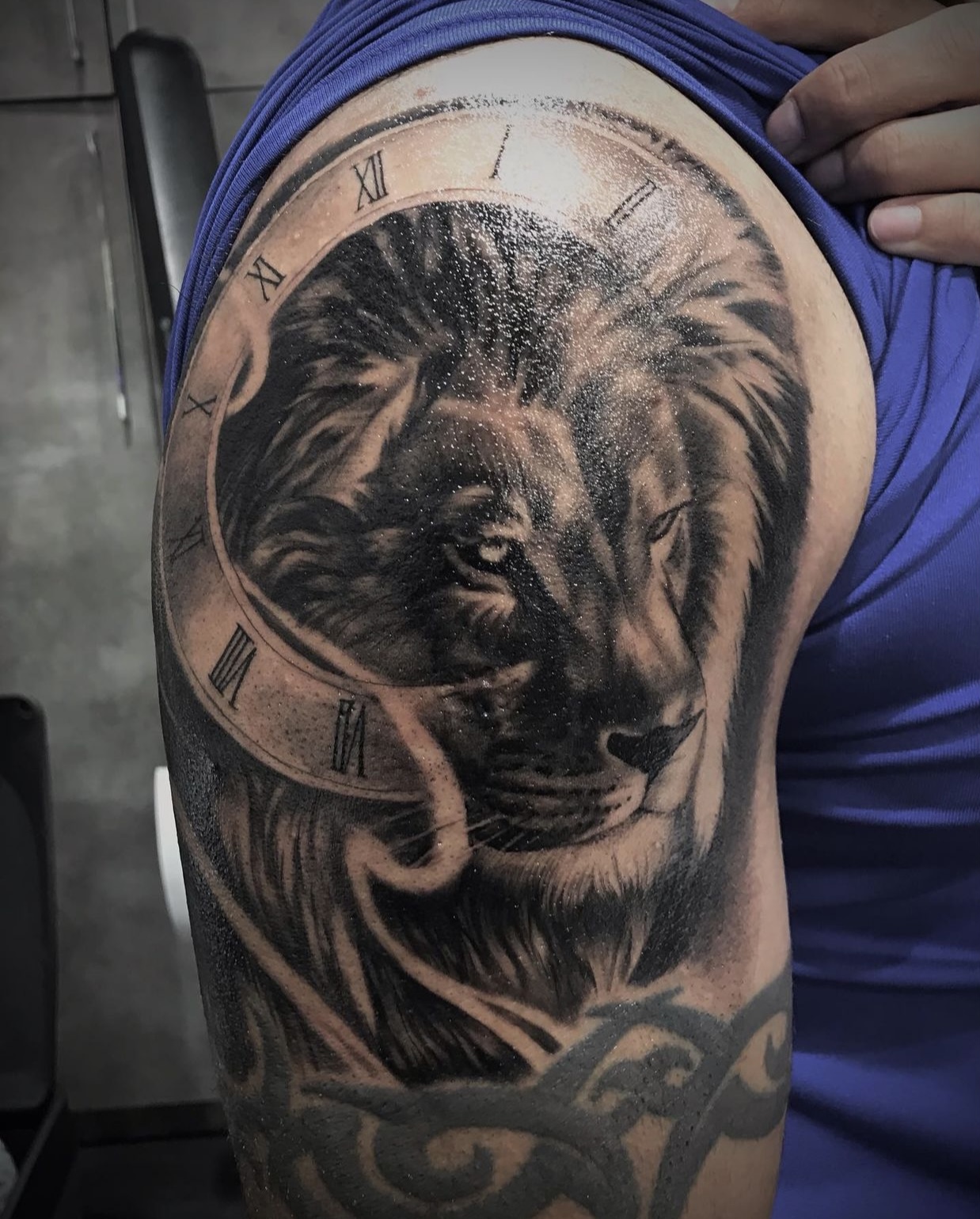 lion clock tattoo